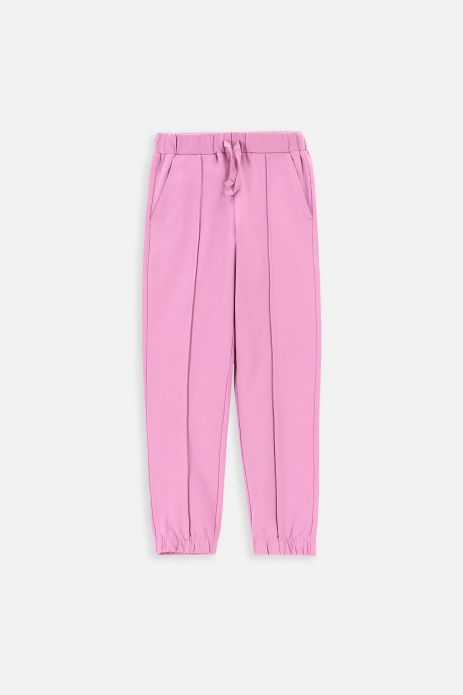 Teplákové nohavice růžové s prešívaním a vreckami