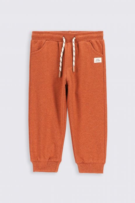 Teplákové nohavice oranžové s potlačou medvedíka